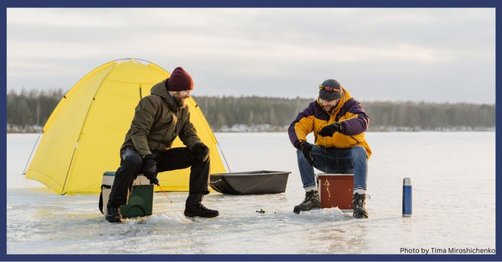 Two people ice fishing